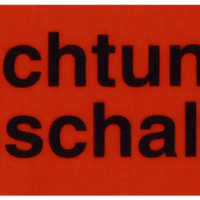 Placca di avviso autoadesiva (Achtung Fernschaltung) rosso/nero 